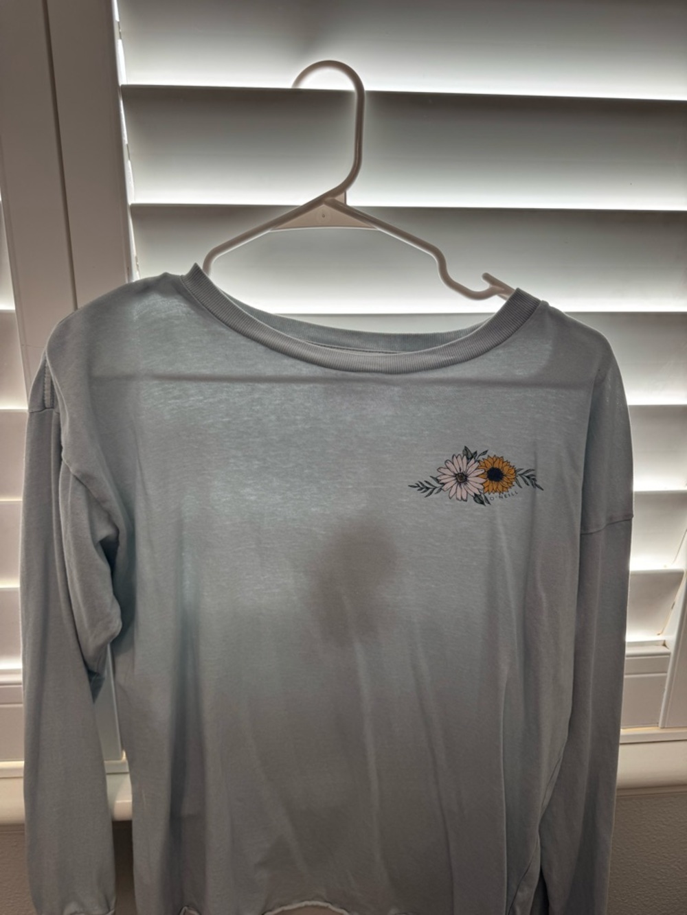 O’Neill Teal Blue Long Sleeve Tee with Floral design